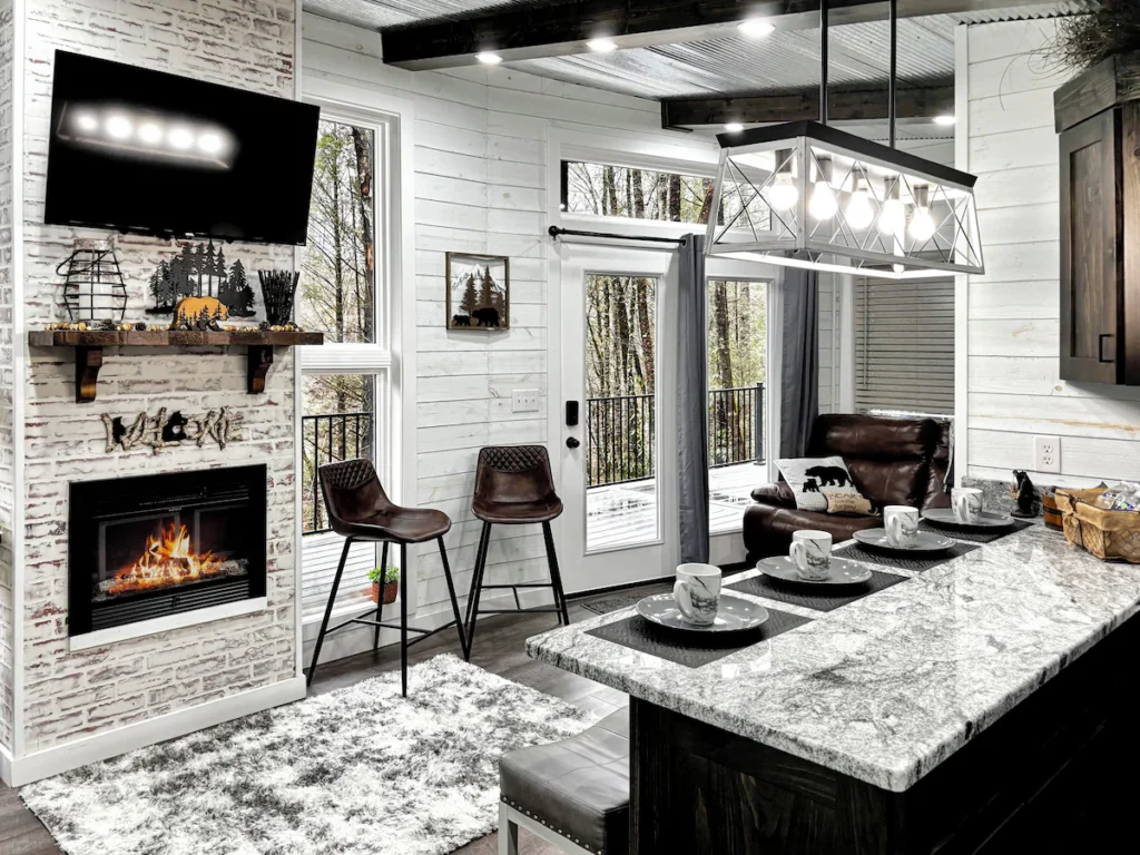 Gatlinburg cabin kitchen and living area with fireplace